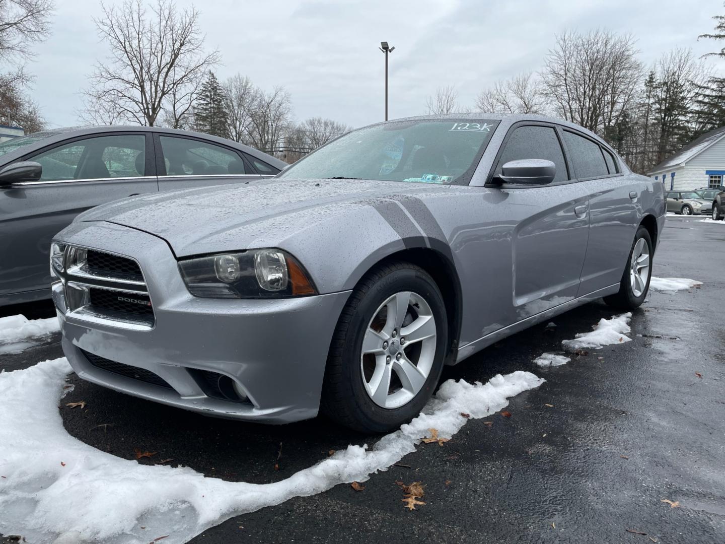 2014 silver Dodge Charger SXT (2C3CDXHG1EH) with an 3.6L V6 DOHC 24V engine, 8-Speed Automatic transmission, located at 101 N. Main Street, Muncy, PA, 17756, (570) 546-5462, 41.207691, -76.785942 - Photo#0